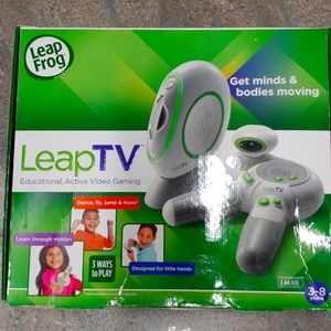 LeapTV educational active, video game system with 7 games and extra controller